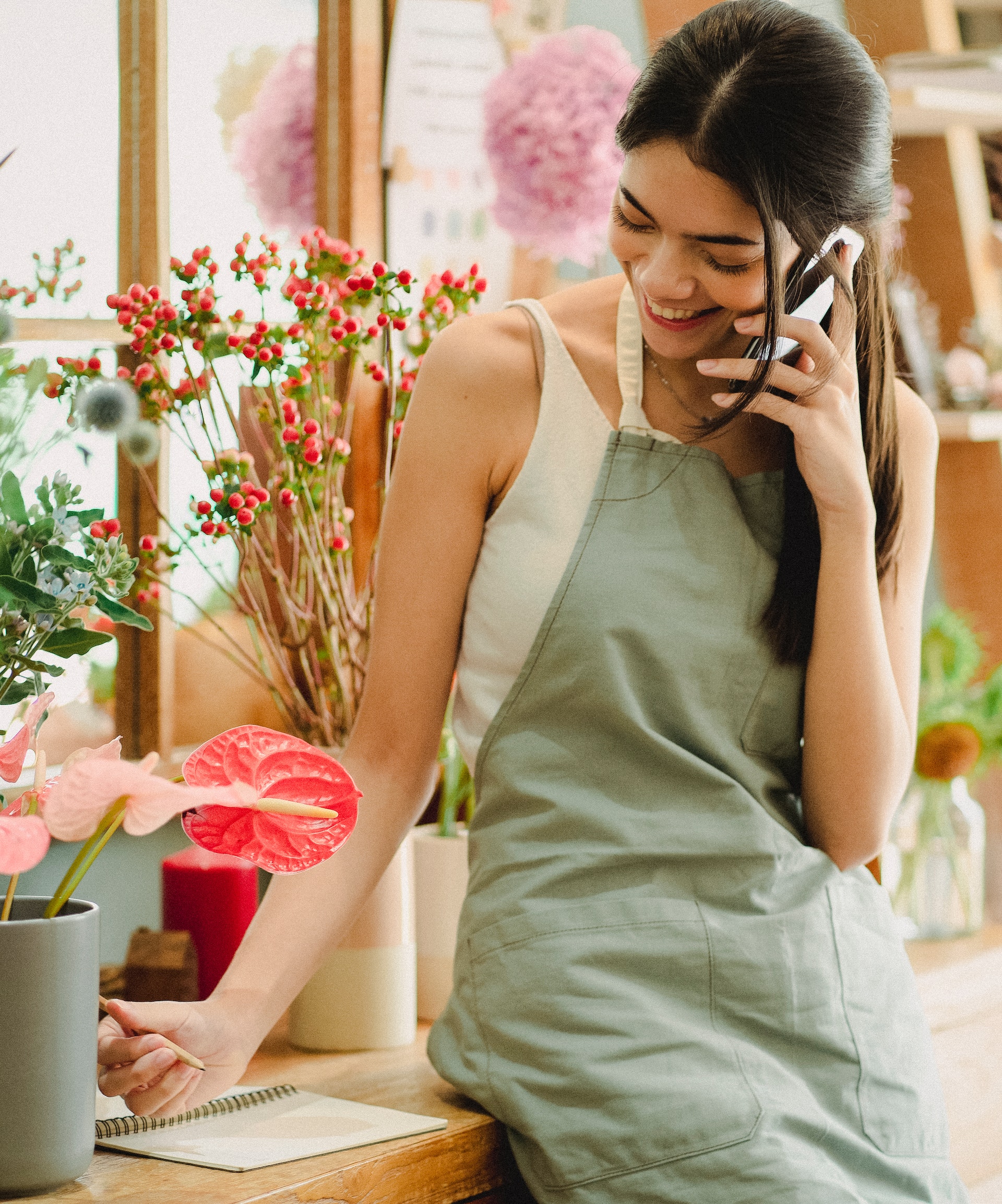 flower shop girl with phone